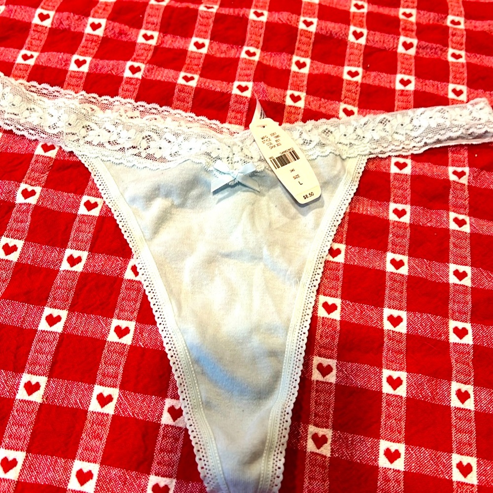 Light blue cotton, Victoria’s Secret thong with lace elastic. NWT.